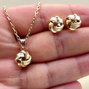 Gold jewelry necklace set, love knot gold set, 18 Karat Yellow Gold necklace and earrings set.
