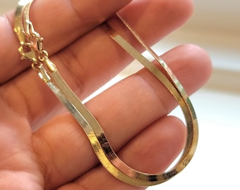 希少なティファニー 18K ゴールドとシルバーのフック アンド 希少なティファニー 18K ゴールドとシルバーのフック アンド