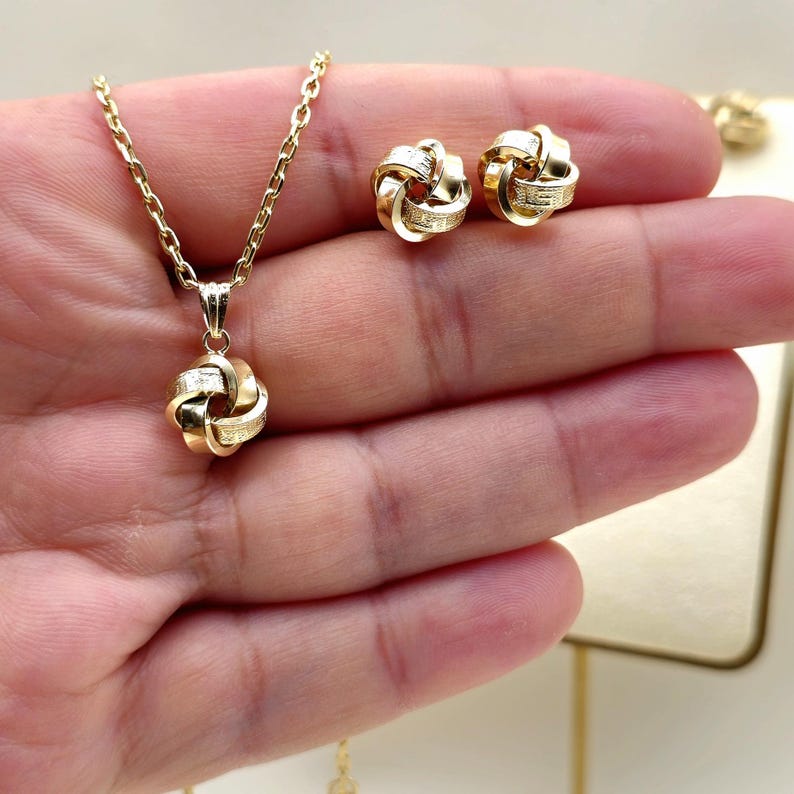 Gold jewelry necklace set, love knot gold set, 18 Karat Yellow Gold necklace and earrings set.