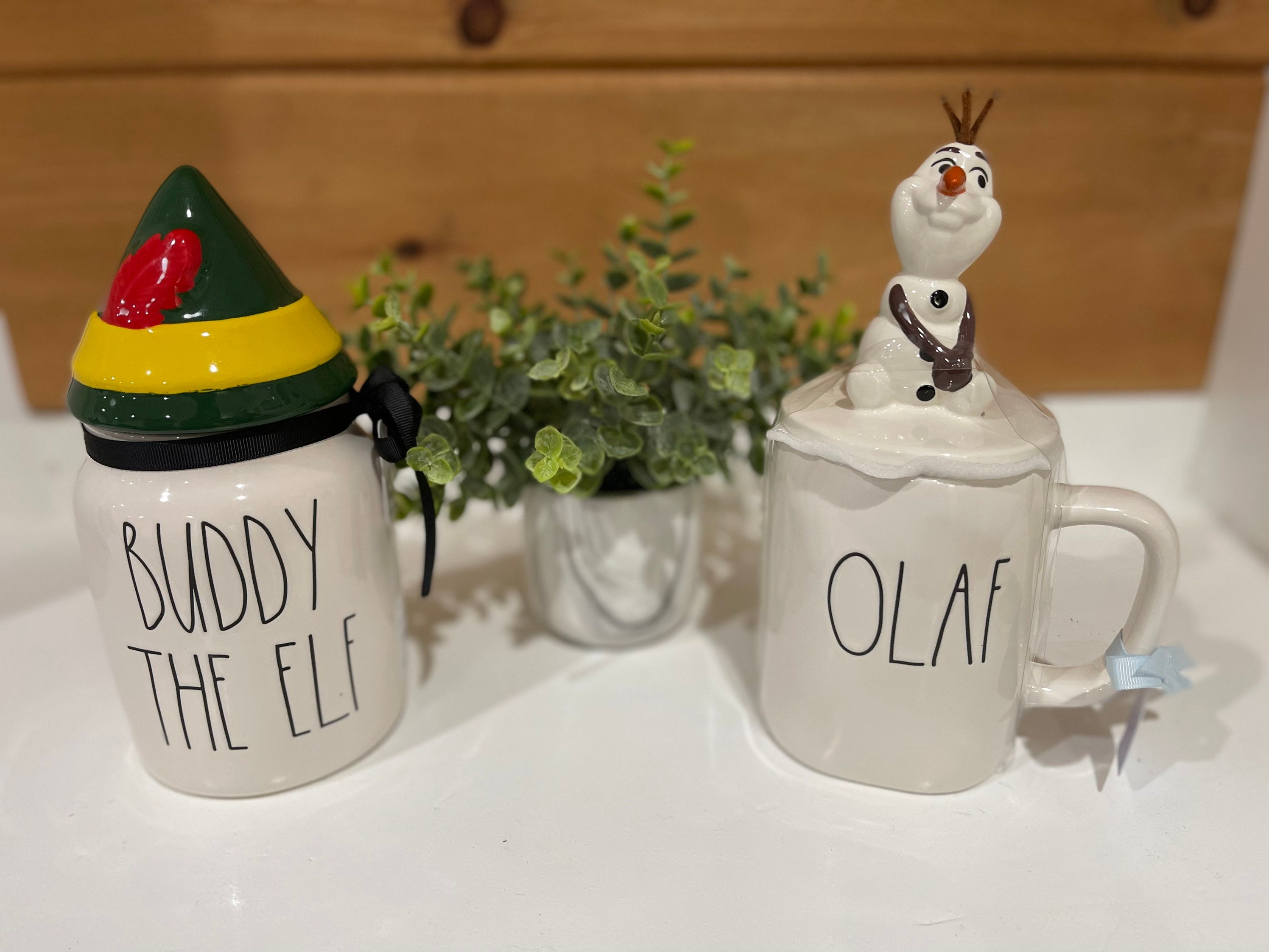 Rae Dunn buddy the elf and son of the nutcracker canister set town
