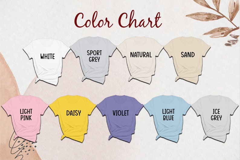 Puede incluir: Una carta de colores que muestra nueve camisetas de manga corta en varios colores, cada una etiquetada con texto: White, Sport Grey, Natural, Sand, Light Pink, Daisy, Violet, Light Blue e Ice Grey. Las camisetas est&aacute;n dispuestas en dos filas.