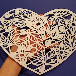 Heart shaped paper cutting picture