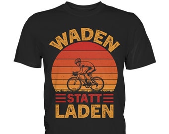 May include: Black t-shirt with a retro sunset graphic featuring a cyclist riding a bicycle. The text "WADEN STATT LADEN" is printed below the graphic.