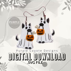 May include: A digital download SVG file of a pair of Halloween ghost dog earrings. The ghosts are white with black eyes and mouths, and they are holding orange pumpkins with black jack-o'-lantern faces. The earrings are on a white background with a floral design.