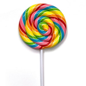 May include: A colorful lollipop with a spiral design. The candy features a swirl of rainbow colors, including red, orange, yellow, green, blue, and pink. It is mounted on a white stick.