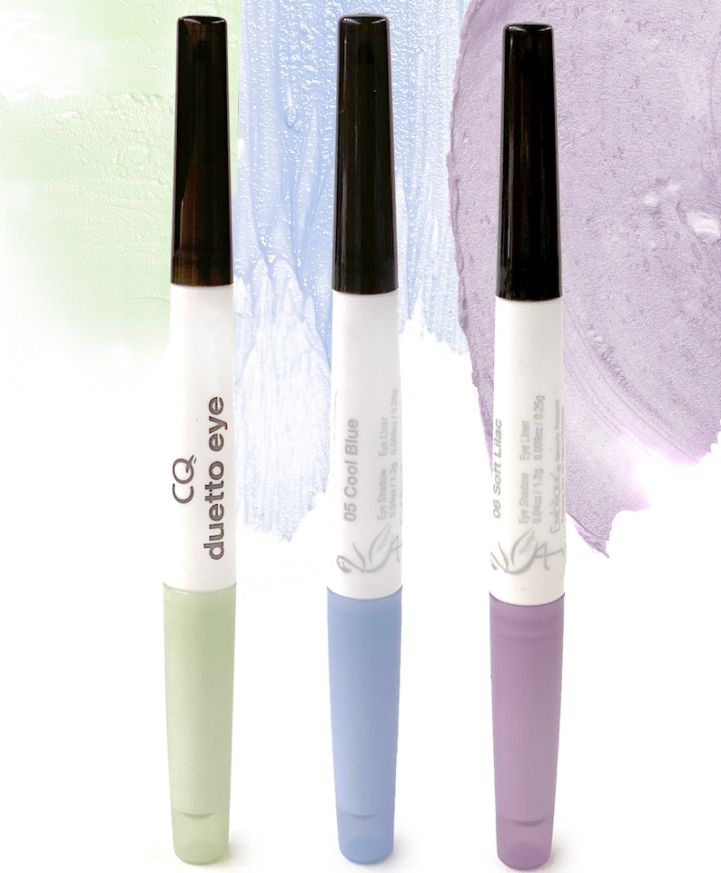 May include: Three tubes of eye shadow and eyeliner in green, blue, and purple. The tubes are labeled "CQ duetto eye", "05 Cool Blue", and "05 Soft Lilac".