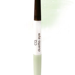 May include: A white and green dual-ended makeup stick with the text "CQ duetto eye" printed on the side.