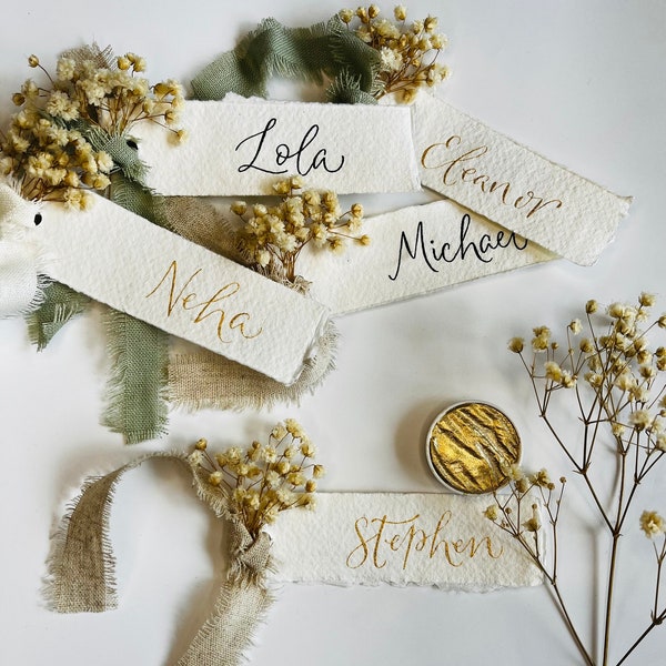 Dried flower and linen ribbon luxury wedding place cards, name cards, place setting.