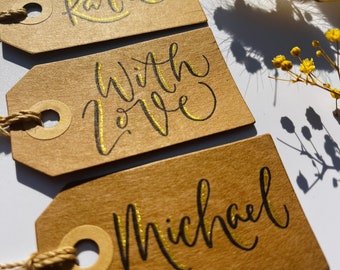 Set of personalised handmade hand-written gift tags, name tags with gold detail added, fully personalised and handmade.
