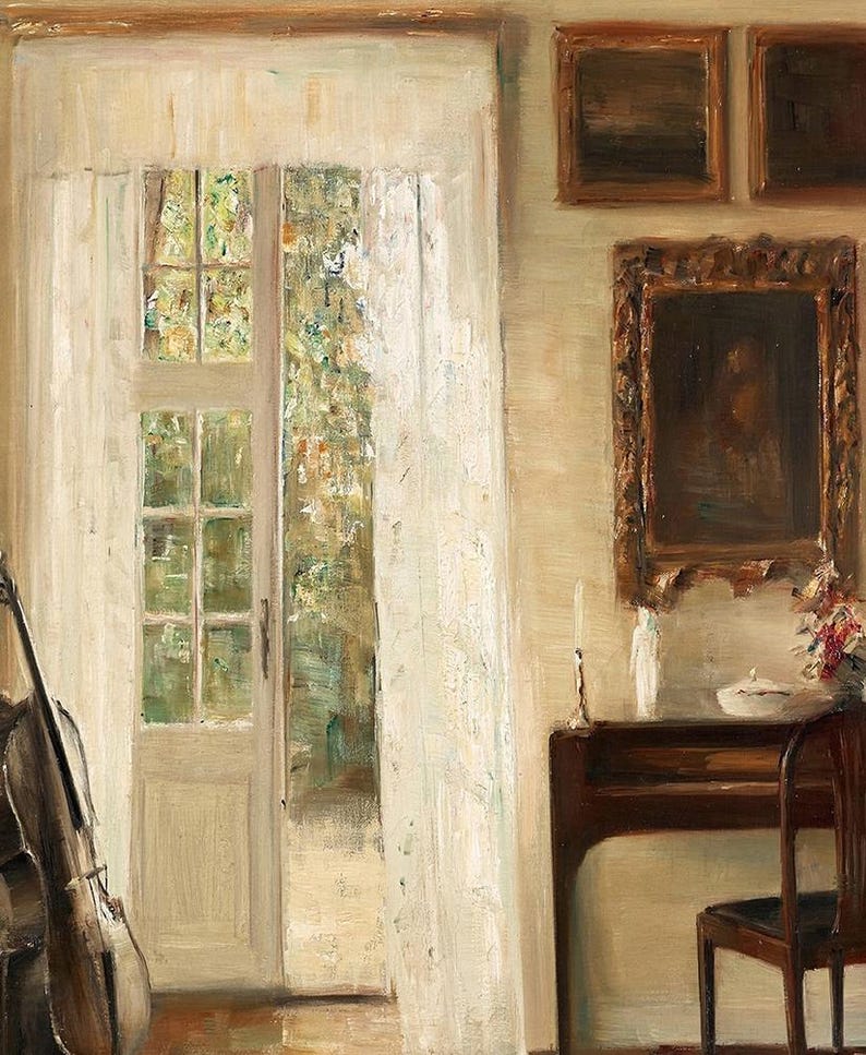 May include: An oil painting depicts a room with a door and window, a cello, and a small table with a chair. The door is open to a view of greenery. A framed painting hangs above the table, and two smaller paintings are on the wall.