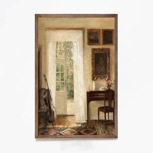 May include: An oil painting depicts a room with a cello, a table, and a doorway. The cello leans against a chair near a window with sheer curtains. A small table holds candles and flowers. The artwork is framed in a brown wooden frame.