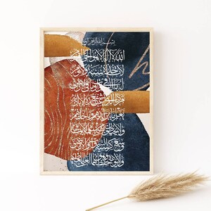May include: Abstract art print with a blue, orange, and gold colour scheme. The print features Arabic calligraphy in white, with the text "Bismillahir Rahmanir Rahim".