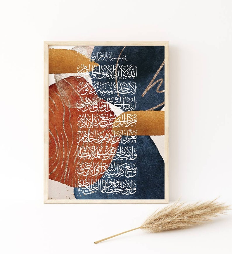 May include: Abstract art print with a blue, orange, and gold colour scheme. The print features Arabic calligraphy in white, with the text "Bismillahir Rahmanir Rahim".