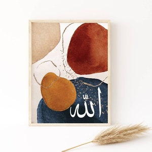 May include: Abstract art print featuring watercolour shapes in shades of brown, orange, blue, and white. The Arabic word "Allah" is written in gold glitter on a blue background.