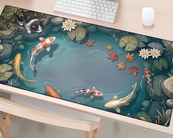 May include: A rectangular desk mat featuring an illustration of a pond with several koi fish in shades of orange, white, and gold. The scene includes lily pads, white water lilies, scattered red maple leaves, gray rocks, and a black and white cat.