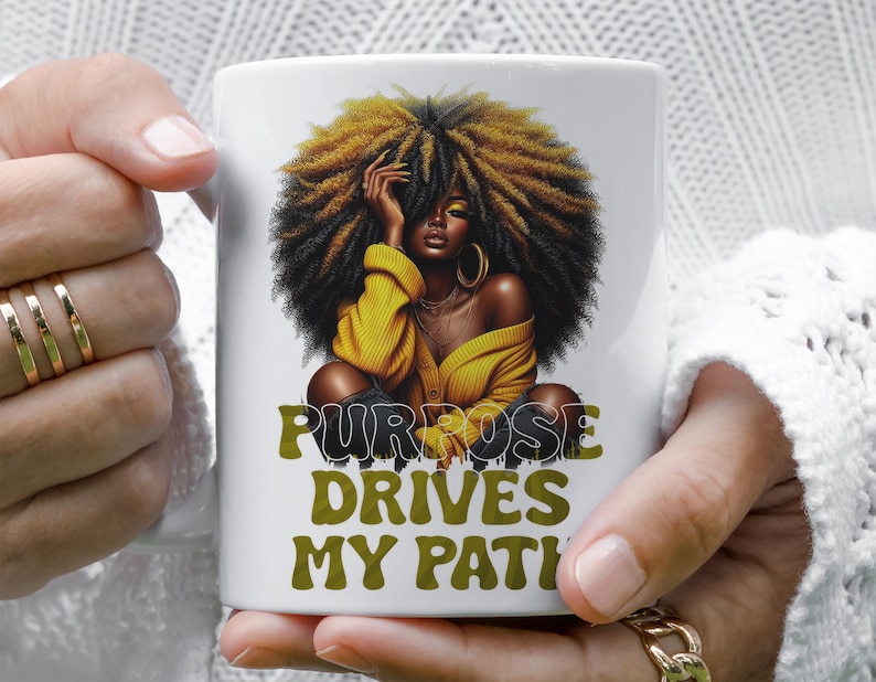 a woman holding a coffee mug with a picture of a woman with dreadlocks