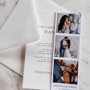 May include: A wedding invitation card with a photo collage of the couple and their dog. The card is white with black text that reads "VON GANZEM HERZEN DANKE..." and "CHRISTINA & TOBIAS 23. April 2023".