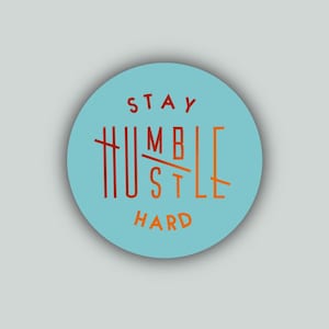 May include: A blue circle with the text "STAY HUMBLE HUSTLE HARD" in a red and orange gradient.