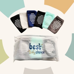 May include: A set of baby knee pads in various colors, including black, gray, navy, and teal, with white non-slip grips. The pads are displayed above a clear plastic bag with the text "best Baby choice" in blue and gold.