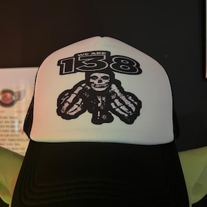 We are 138 middle finger Misfits inspired trucker hat.