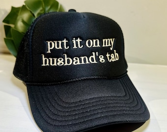 embroidered put it on my husband’s tab trucker hat