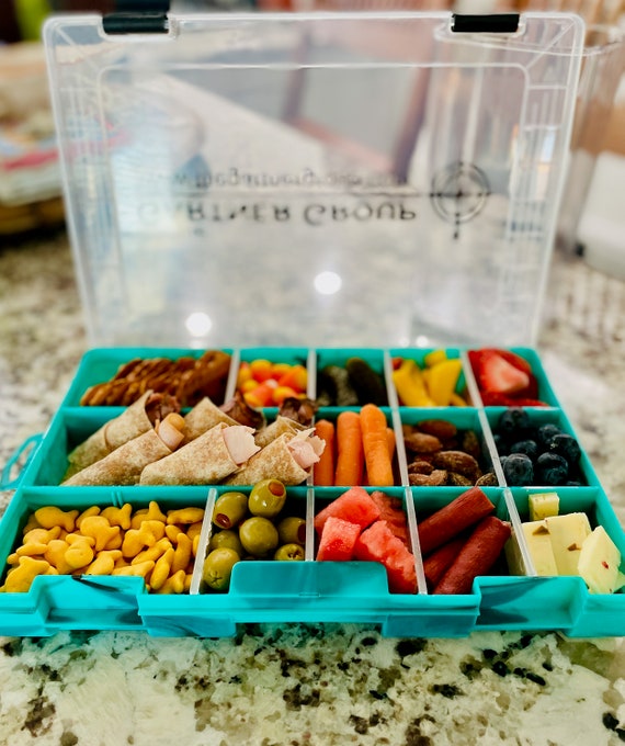 Road trip idea for toddler- tackle box with snacks