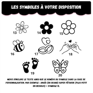 May include: A white background displays black line art symbols with numbers. Symbols include flowers, a bee, wedding rings, clasped hands, footprints, and a butterfly. Text at the top reads "LES SYMBOLES &Agrave; VOTRE DISPOSITION".