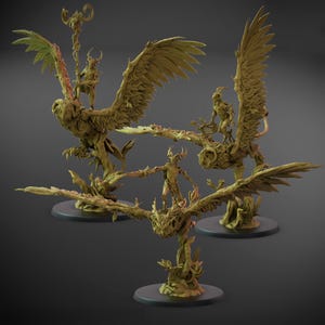 May include: Three detailed fantasy figurines. Each figurine features a winged creature with a humanoid figure riding on top. The creatures are a muted green color, with intricate details. The figurines are on round, dark gray bases.