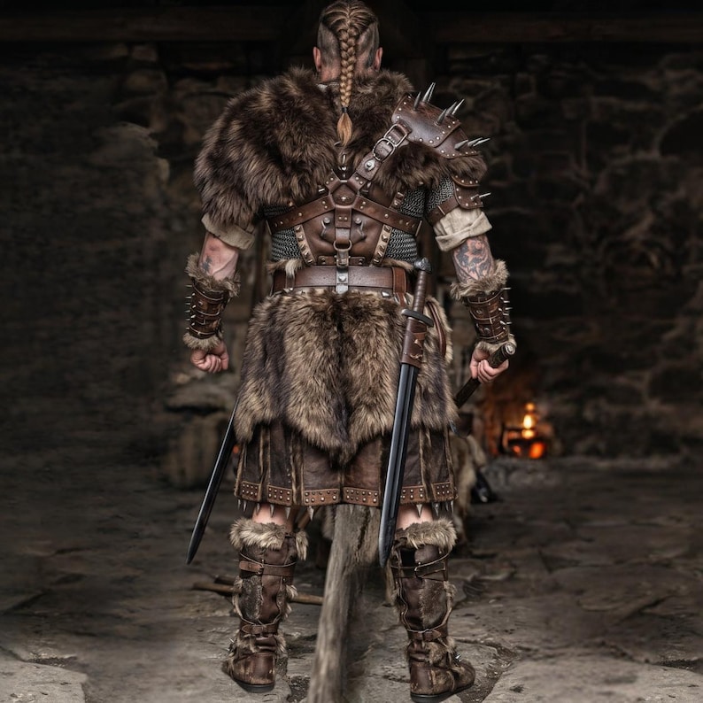 May include: A warrior's ensemble featuring a fur cloak, leather armor, and a skirt. The outfit includes spiked shoulder pads, wrist cuffs, and boots. Two swords are held at the sides. The color palette is dominated by browns and tans, with a focus on texture.