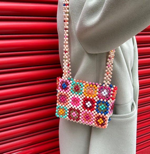 This affordable Anthropologie bag is a dupe for Staud's popular beaded purse  — and it's $200 cheaper
