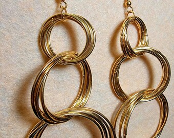 Gold hoop dangle earrings