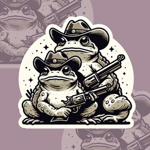 May include: Two cartoon frogs wearing cowboy hats and holding guns. The frogs are sitting on a white background with stars.