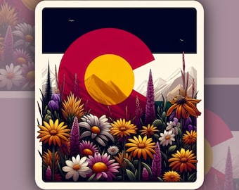 May include: A sticker featuring a colorful illustration of wildflowers in front of a stylized depiction of the Colorado state flag. The flag is red, yellow, and blue with a large yellow circle in the center.