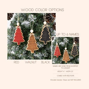 May include: Christmas tree ornaments made of wood in red, walnut, and black finishes. Each ornament features a light-colored wooden bead, a twine loop, and a small bow. The ornaments measure 4 inches in height and 2.5 inches in width.