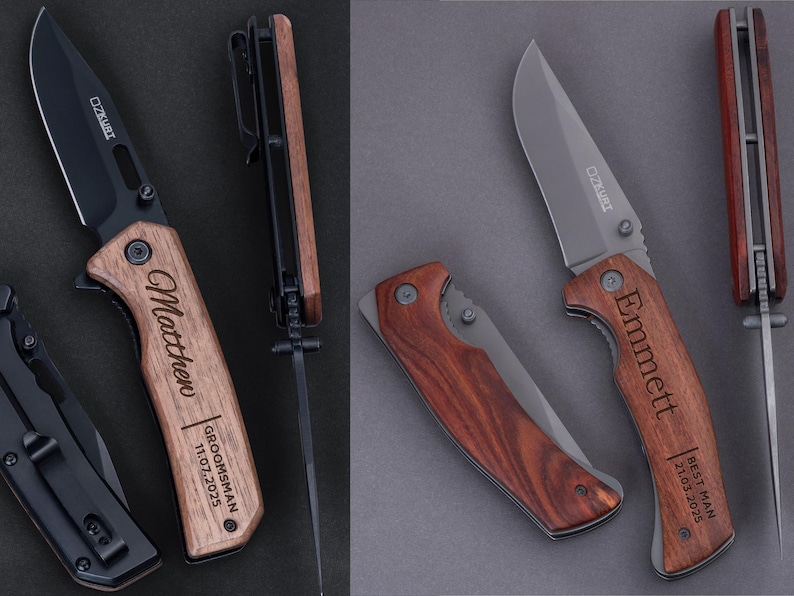 May include: Two personalized pocket knives with wooden handles. The knife on the left has the name "Matthew" engraved on the handle, along with the text "Groomsman 11.07.2025". The knife on the right has the name "Emmett" engraved on the handle, along with the text "Best Man 21.07.2025".