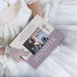 May include: A white wooden picture frame with a purple border and a white cross. The frame has a photo of a young girl in a white dress and a white lace glove. The frame has the text "GOD SHALL GIVE HIS ANGELS CHARGE OVER YOU TO GUARD YOU IN ALL YOUR WAYS PSALM 91:11" and "JENNIFER 10.12.2023".