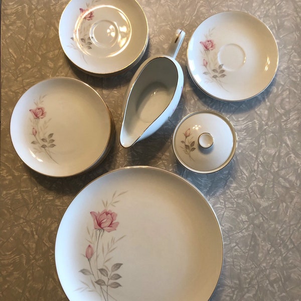Vintage Camelot fine china , American Rose 1655 Japan . Dishes, saucers,sugar cup ,and gravy boat