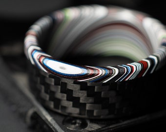 1k Twill Carbon Fiber Ring Lined With Tilted Premium Fordite In a Flipped Cuff Design. Matte Finish Carbon Fiber. Waterproof Gift For Men