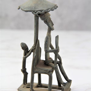 Ashanti King Sitting on Throne, casted in bronze, Weighs Gold, Antic Bronze, Ashanti Gold weight, Bronze Sculpture