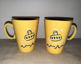 Juego de 2 tazas vintage Just Mugs con diseño de velero amarillo y azul
