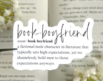 May include: A white sticker with black text that reads "book boyfriend" and defines the term as a fictional male character in literature that typically sets high expectations, yet we shamelessly hold men to those expectations anyways.