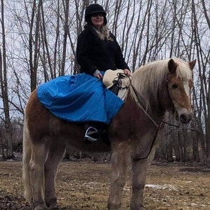 Beautiful turquoise winter riding wrap