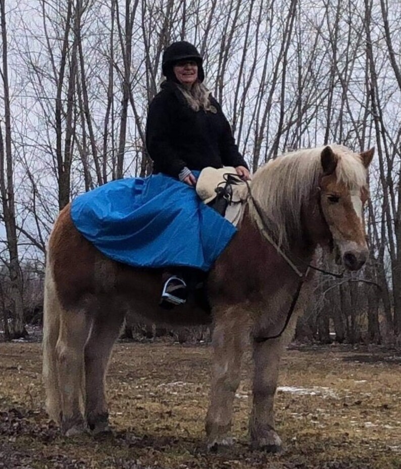 Beautiful turquoise winter riding wrap