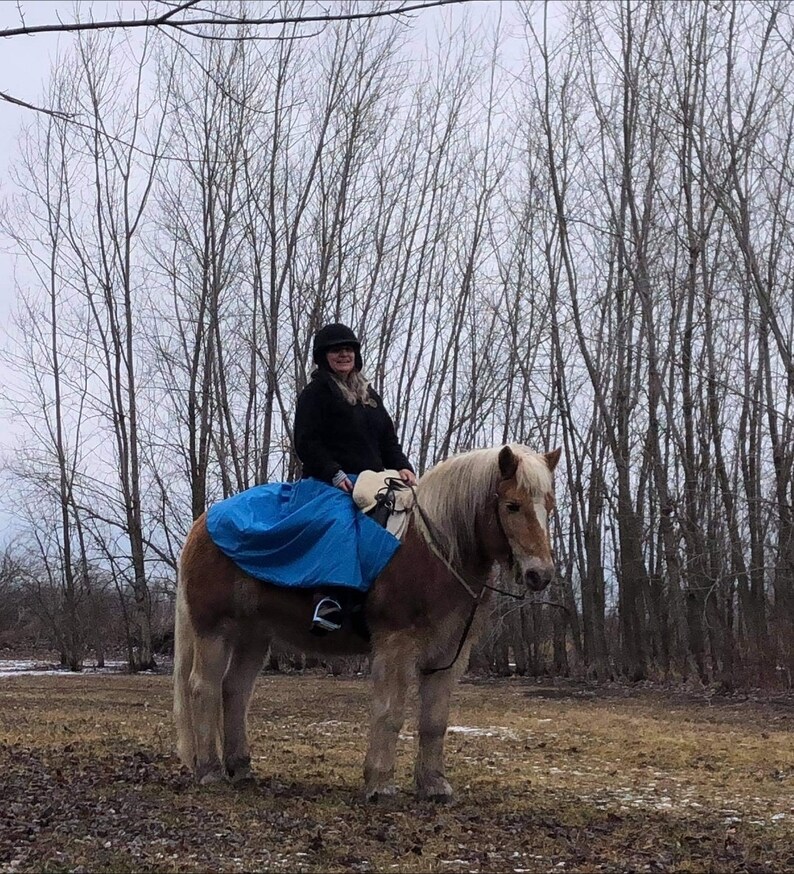 Beautiful turquoise winter riding wrap