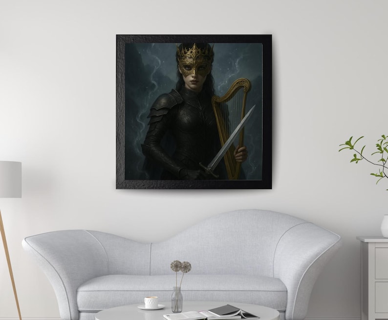 May include: Framed artwork featuring a figure in dark armor, a gold crown, and a mask, holding a sword and a harp. The artwork has a dark, dramatic background and is displayed in a black frame. The image is hanging above a white sofa.
