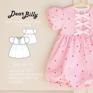 May include: A pink gingham dress with red heart accents and puff sleeves hangs on a gold hanger. The dress features three pink bows on the bodice. The image also shows a PDF sewing pattern with the text "Dear Billy" and "PDF Sewing Pattern + Tutorial."