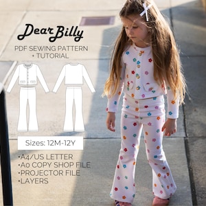 May include: White floral print outfit with a jacket and flared pants. The outfit is worn by a young child. The image also includes a sewing pattern with the text "Dear Billy PDF Sewing Pattern + Tutorial" and sizes 12M-12Y.