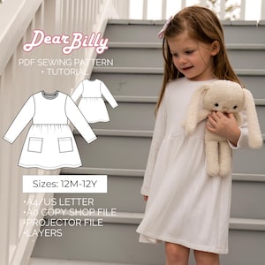 Könnte beinhalten: Ein PDF-Schnittmuster für ein weißes Kleid mit langen Ärmeln und Taschen. Das Schnittmuster heißt "Dear Billy" und umfasst die Größen 12M-12Y. Das Schnittmuster wird mit einer Anleitung geliefert und umfasst die Formate A4/US Letter, A0 Copy Shop File, Projector File und Layers.