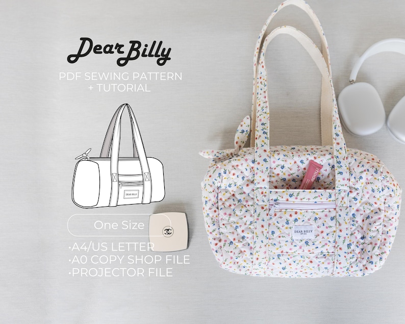 May include: A floral print duffel bag with cream-colored handles and a front pocket. The bag has a zipper closure and a small pink tube in the pocket. The image also includes a line drawing of the bag and text that reads "Dear Billy PDF Sewing Pattern + Tutorial."