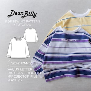 Könnte beinhalten: Zwei langärmlige Hemden, eines gestreift in Blau, Lila und Weiß, das andere gelb mit blauen Streifen. Der Text "Dear Billy" ist auf beiden Hemden aufgedruckt. Ein PDF-Schnittmuster mit Tutorial ist ebenfalls abgebildet, mit Größen für 12 Monate bis 12 Jahre.